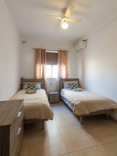 Bedroom 2 with two single beds
